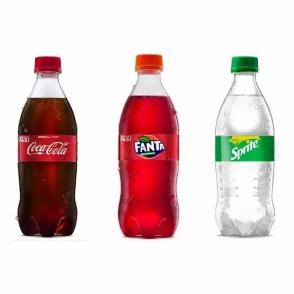 Three carbonated beverages Coca Cola, Fanta and Sprite in plastic bottles red and green labels